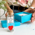Load image into Gallery viewer, Mensaje romántico en una botella para regalar a tu novio o novia Tarro de los deseos con una tarjeta para tu esposo o esposa (bottle in teal blue box Te quiero… sólo quería que lo supieras)