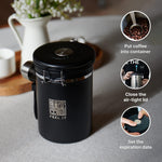 Load image into Gallery viewer, Stainless Steel Coffee Canister 21oz Airtight Kitchen Food Storage Container with Date Tracker CO2 Release Valve and Measuring Scoop For Ground Coffee Beans Tea Sugar Large (Black)